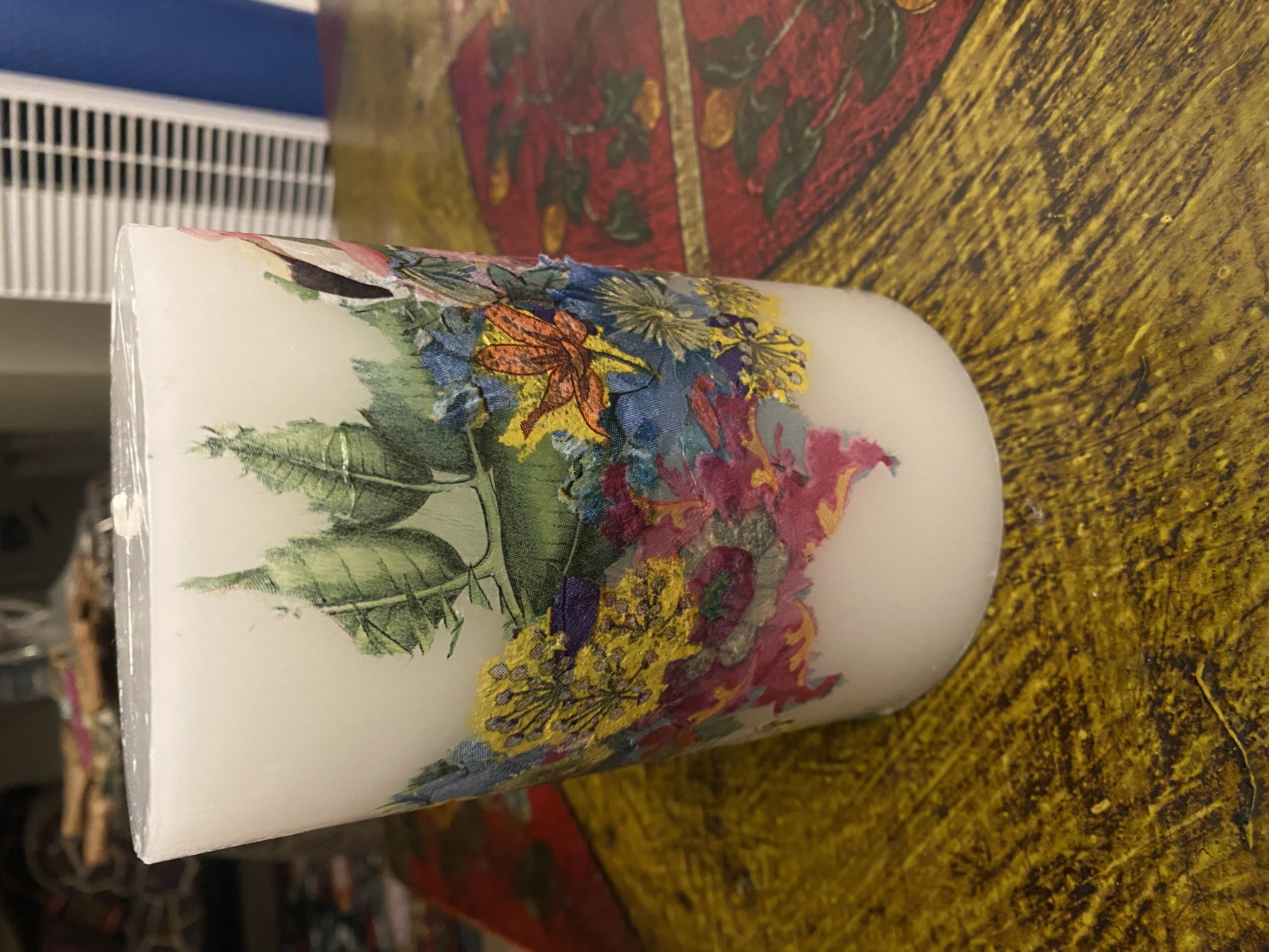 Hand-painted floral pattern on a ceramic jug by Koa Joy Hood